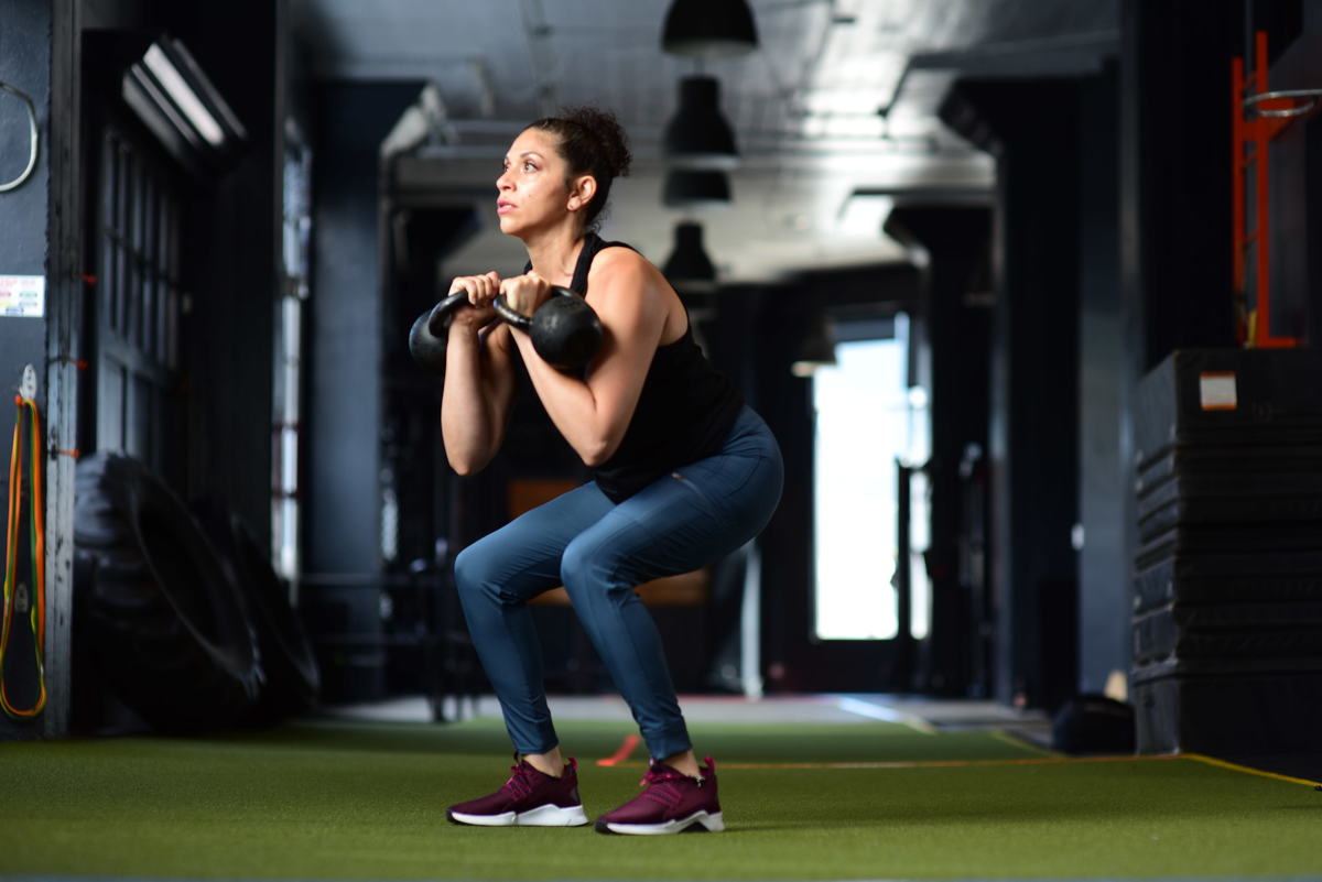 A 12-Minute Kettlebell Arms Workout to Fire Up Your Biceps and