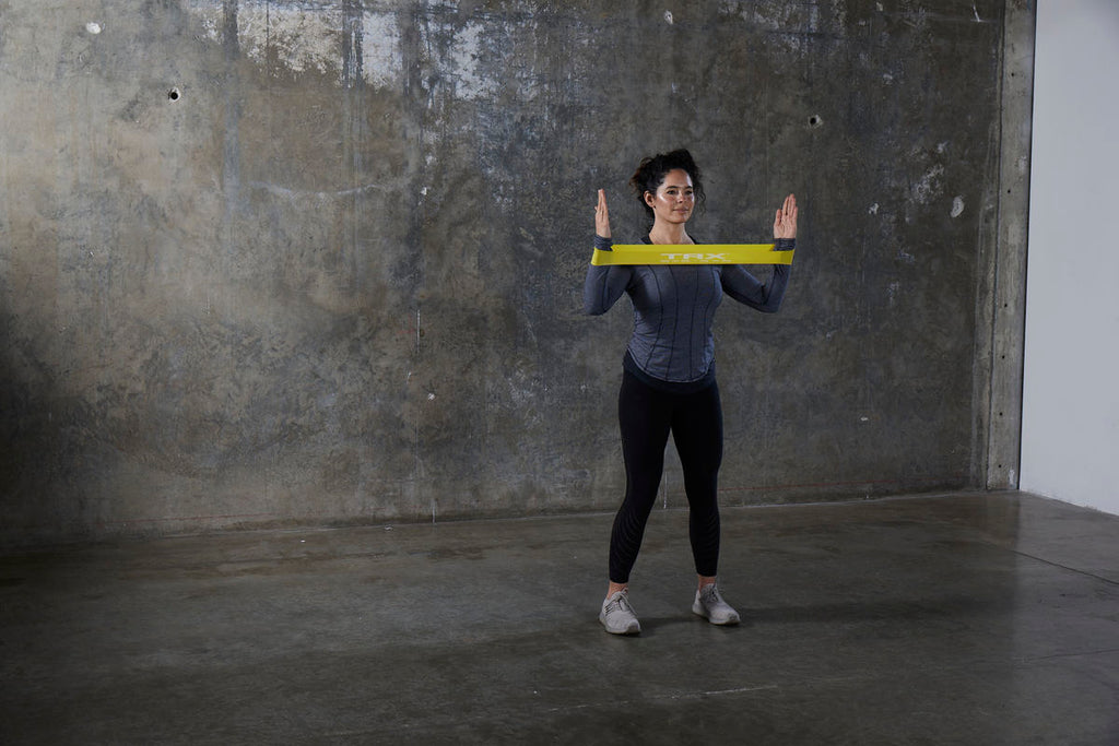 I Tried These Three Resistance Band Stretches To Mobilize My Tight
